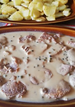A picture of Pork Tenderloin with Pepper Sauce.