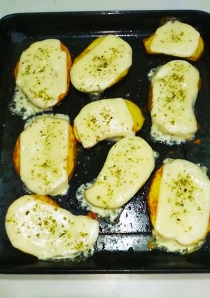 Una foto de Papas al horno con queso mozzarella