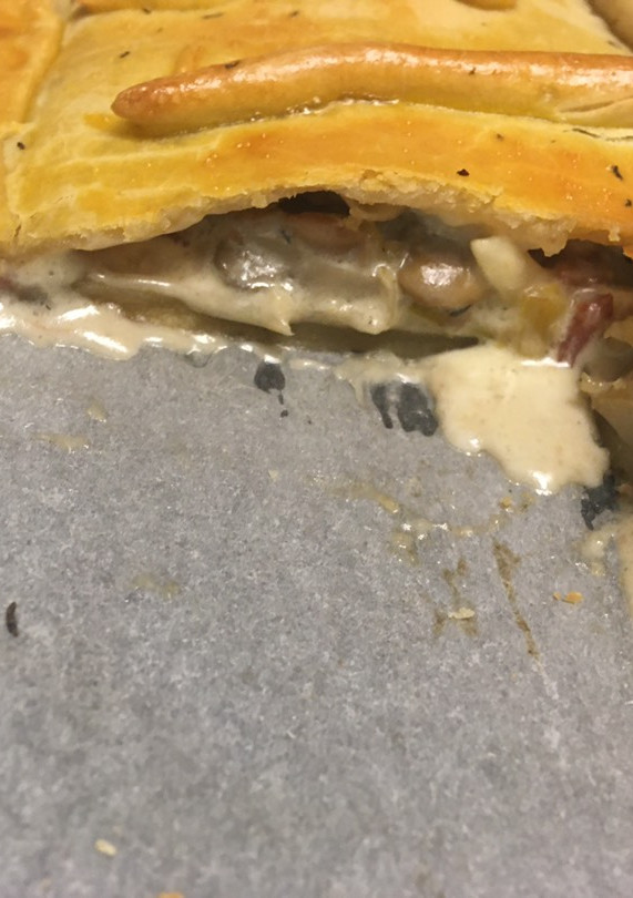 Una foto de Empanada de champiñones