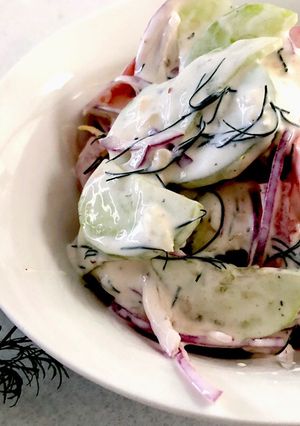 A picture of Creamy Cucumber and Tomato Salad.