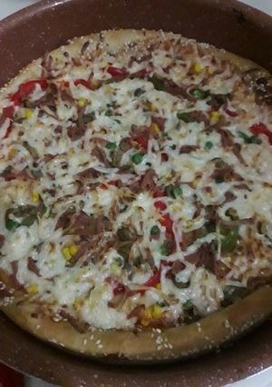 صورة لوصفة بيتزا...الخضار 😋