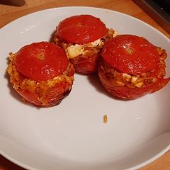 A picture of Greek Stuffed Tomatoes.