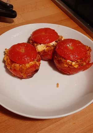 A picture of Greek Stuffed Tomatoes.
