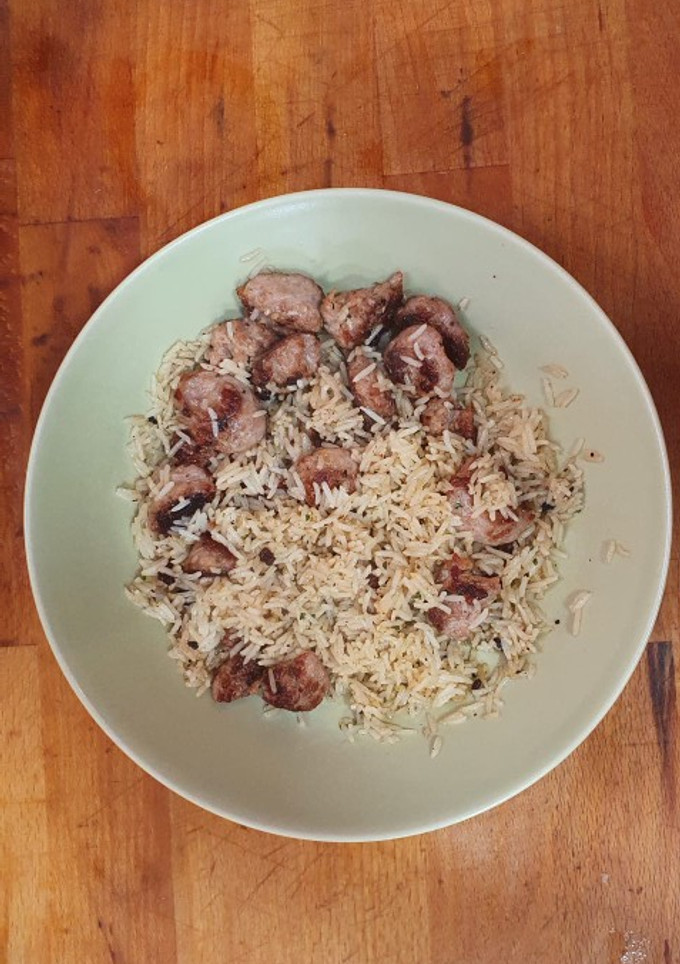 Una foto de Butifarra con arroz