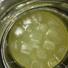A picture of Pineapple and apple drink.