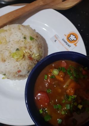 A picture of Chicken Shashlik with Vegetable Fried Rice.