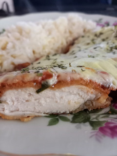 Una foto de Milanesas napolitanas de pollo 🐣