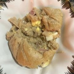 Moi moi / egg sausage and minced beef A picture of Moi moi / egg sausage and minced beef.