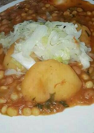 A picture of Githeri with Irish potatoes and steamed cabbages.