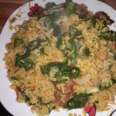 A picture of Jollof rice with spinach(alyyahu).