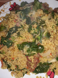 A picture of Jollof rice with spinach(alyyahu).