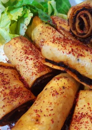 A picture of Lahm Bi Ajeen Chicken Rolls.