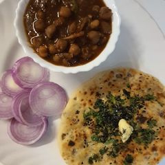 Amritsari chole with aloo kulcha A picture of Amritsari chole with aloo kulcha.