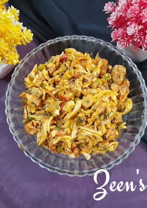 A picture of Vegetables and Chicken Pasta.