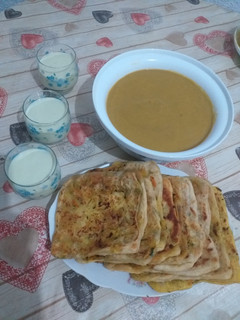 Foto principal de Sopa y pan con zanahoria y calabacín