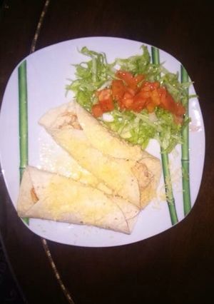 A picture of Burritos with Chicken, Ham, and Cheese. Grams of Love!!!.