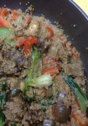 A picture of Quinoa with chicken and stir fried Asian veggies.