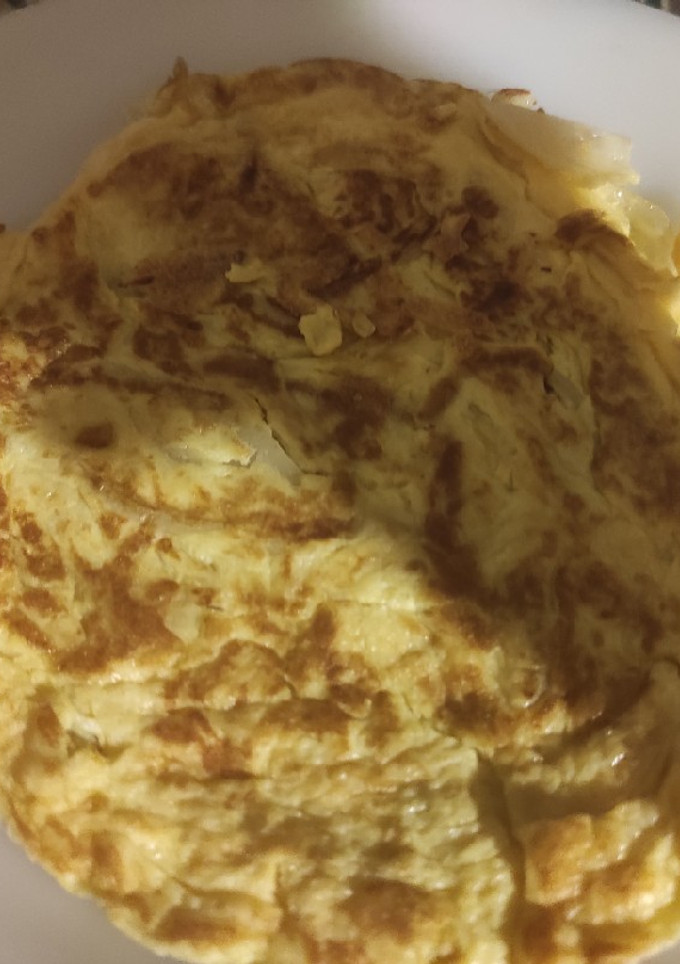 Una foto de Tortilla francesa con cebolla