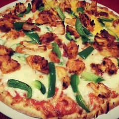 A picture of Chicken Fajita pizza.