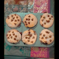 A picture of Vanilla Muffins with chocolate chips.