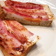 A picture of Egg-in-a-Hole Bacon Toast.
