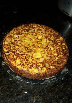 Una foto de Tortilla de papa, con zanahoria rallada
