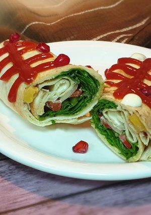 A picture of Khubz jarjeer salad rolls.