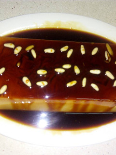 Una foto de Flan de queso y piñones
