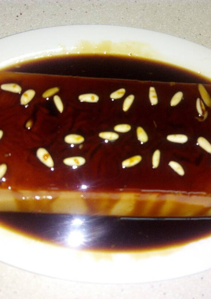 Una foto de Flan de queso y piñones