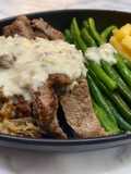 Ribeye steak with mushroom sauce