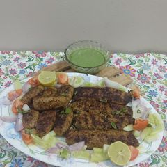 A picture of Chicken mince Turkish kababs Indian style with curd chutney raita.