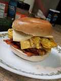 Four Meat, Four Cheese Bagel Breakfast Sandwich