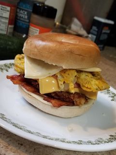 A picture of Four Meat, Four Cheese Bagel Breakfast Sandwich.