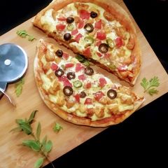 Chicken tikka pizza A picture of Chicken tikka pizza.
