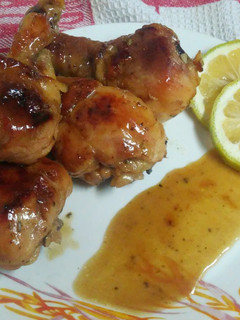 Una foto de Pollo asado con salsa de naranja y miel