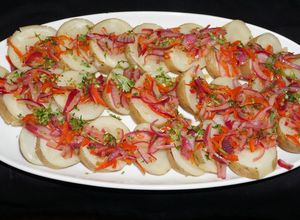 Una foto de Papas escabechadas