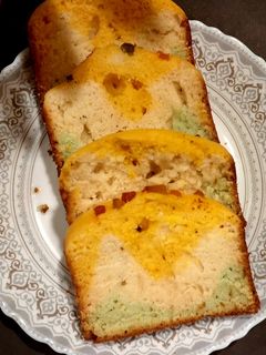 एग्ग्लेस तिरंगा फ्रूट केक रेसिपी मुख्य फोटो