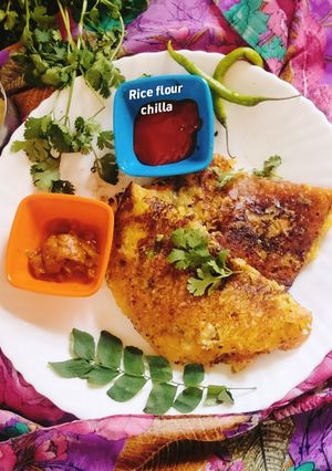 A picture of RICE Flour Chilla 😋 (crispy rice flour chilla 😋).