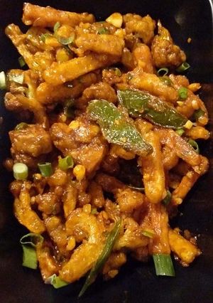 A picture of Fried schezwan potato capcicum.