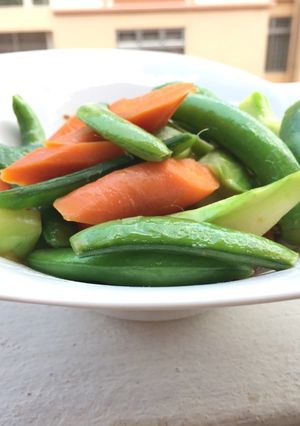 A picture of Sugar Snap Pea And Carrot With Anchovies Sauce.