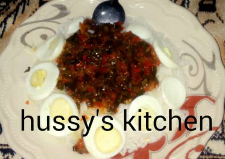 White rice nd green onion sauce with boiled egg