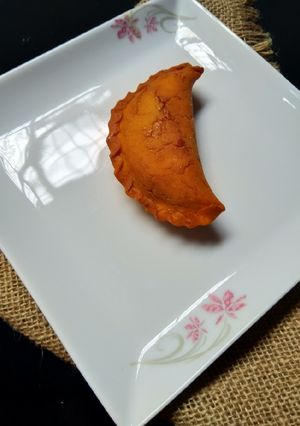তালের রসের ভাজা পুলি পিঠা রেসিপির প্রধান ছবি