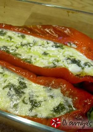 A picture of Bull's horn peppers stuffed with feta cheese.