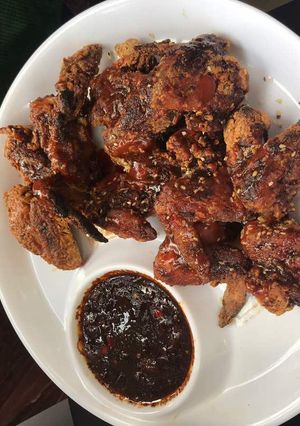 A picture of Crunchy crispy spiced chicken wings.
