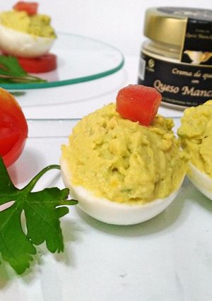A picture of Deviled Eggs with Manchego Cheese Spread and Avocado.
