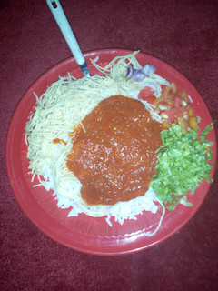 A picture of Rice stew and salad with super gatte.