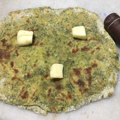 A picture of Palak-Cheese square paratha.