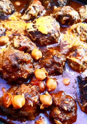 A picture of Meatballs and chickpea pot.