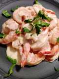 Prawns in bacon and cognac cream