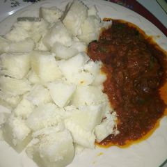 A picture of Boiled Yam with Grilled Chicken Tomatoes Sauce.